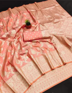 Ethnic Peach Soft Banarasi Silk Saree With Breathtaking Blouse Piece