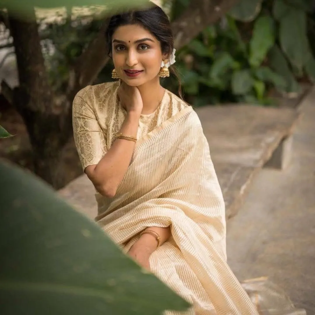 Pretty Beige Soft Silk Saree With Surpassing Blouse Piece