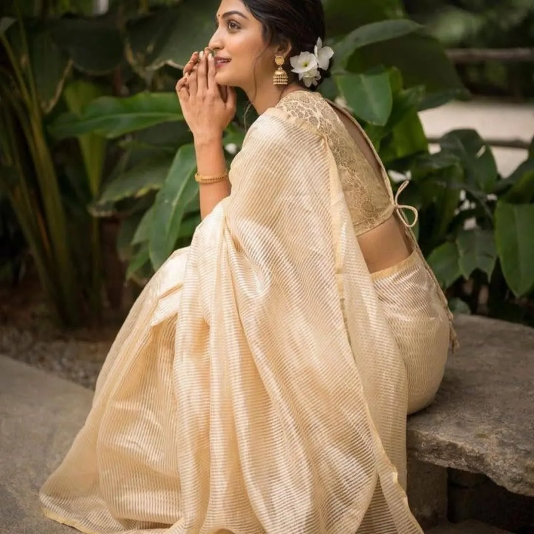 Pretty Beige Soft Silk Saree With Surpassing Blouse Piece